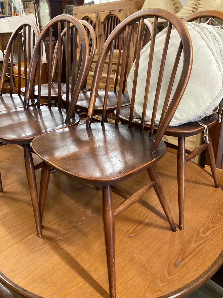 A set of six Ercol elm and beech Windsor dining chairs